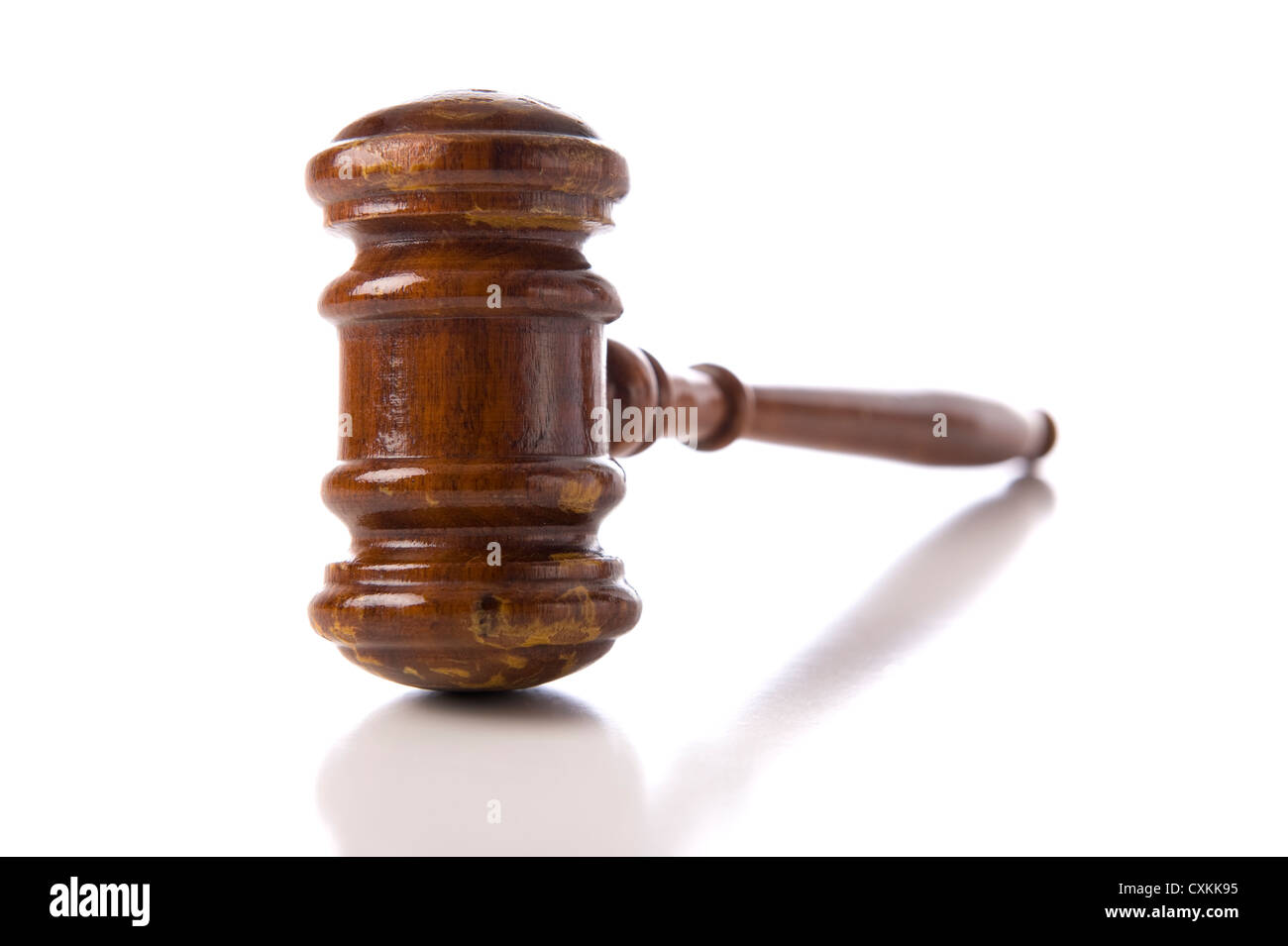 A judges wooden gavel on a white background Stock Photo