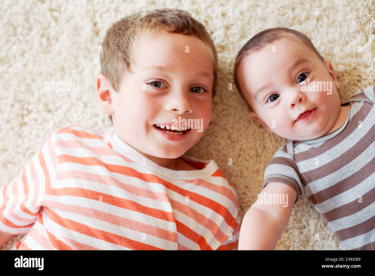 Laying on rug hi-res stock photography and images - Alamy
