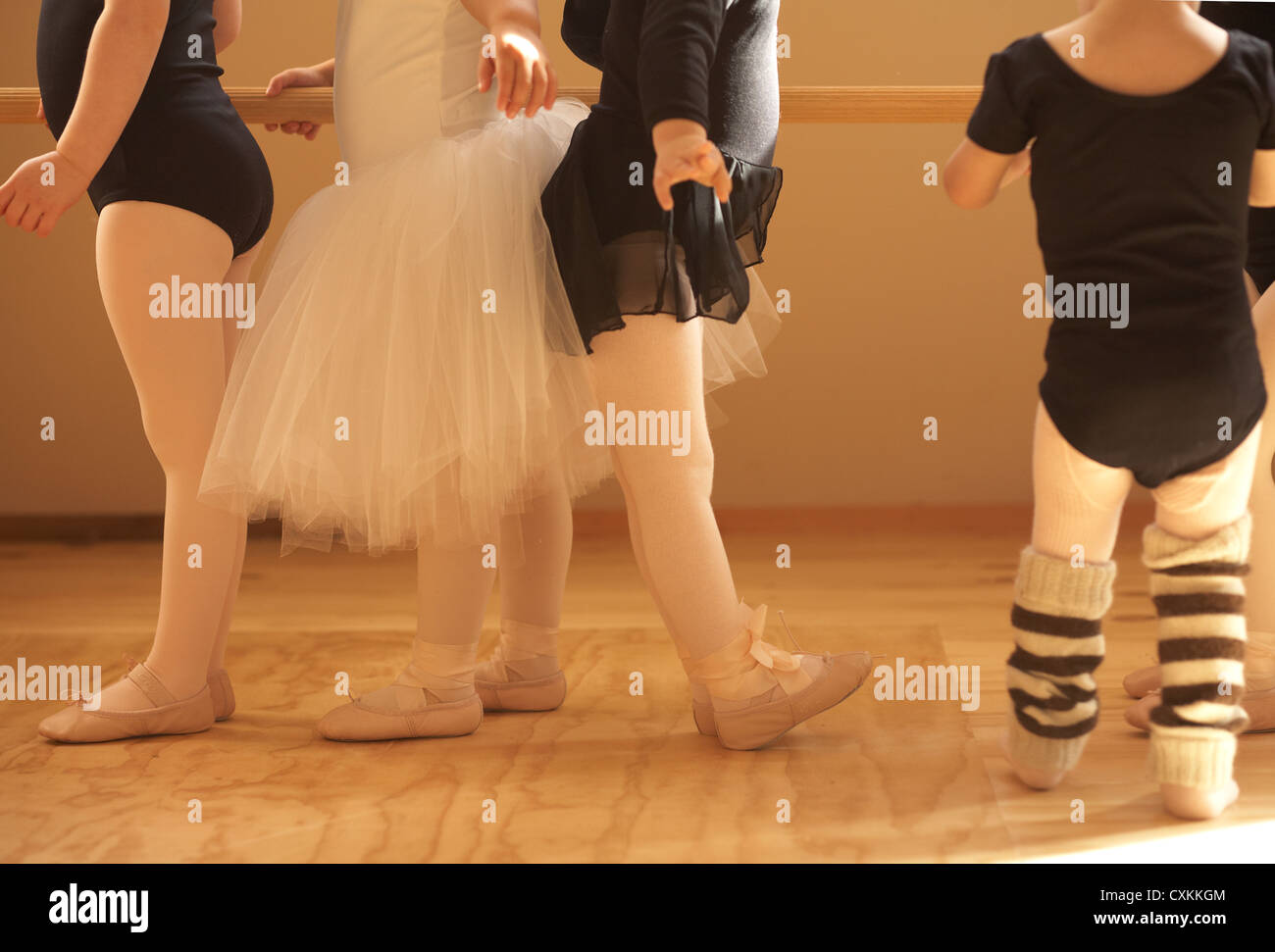 young girls dancing at a ballet barre Stock Photo