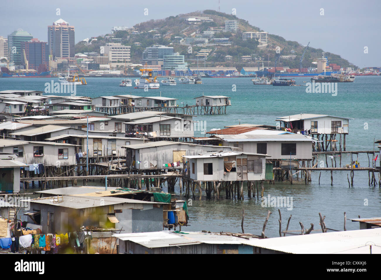 View of the water village, Hanoabada, with Port Moresby in the background, Papua New Guinea Stock Photo