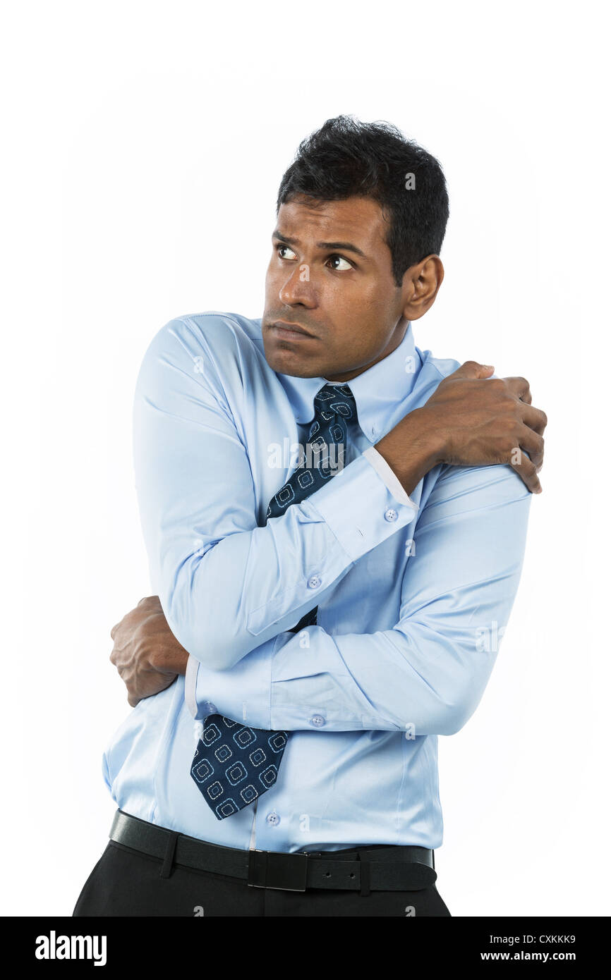 Scared Indian business man. Isolated on white background Stock Photo