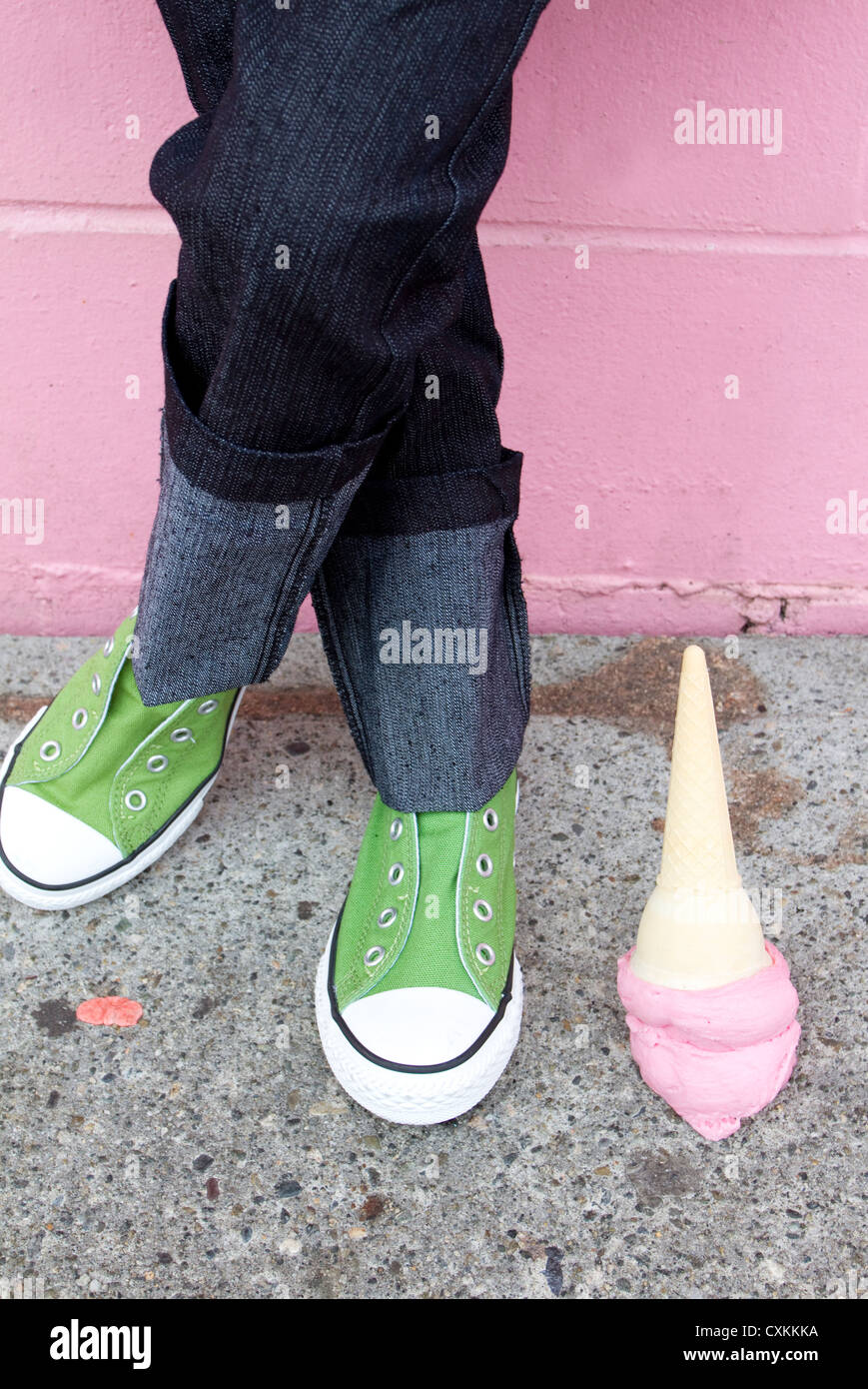 Ice cream cone on the ground Stock Photo Alamy