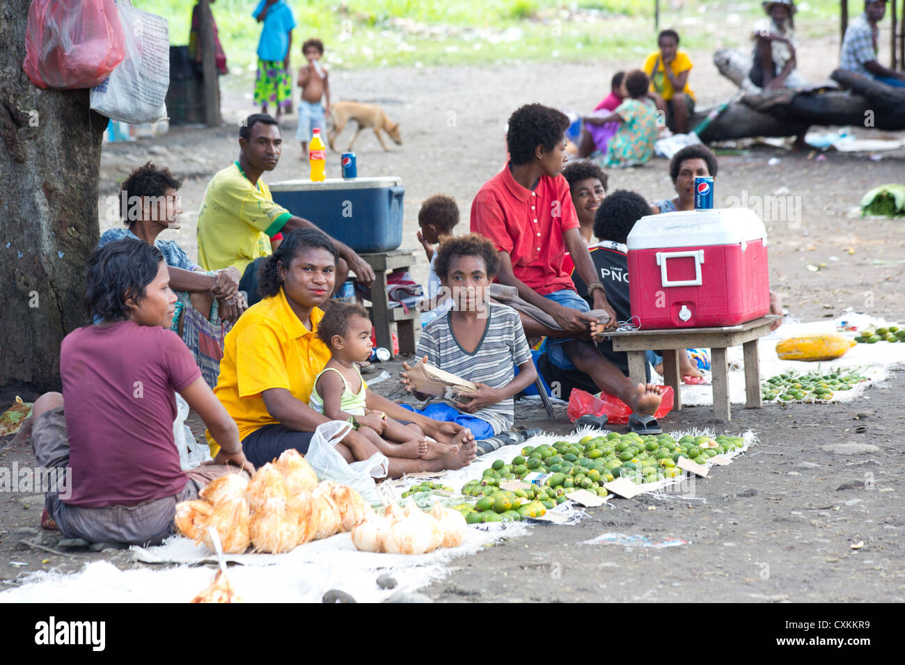 Roadside market where people are selling vegetables and betel nut, near Lae, Papua New Guinea Stock Photo