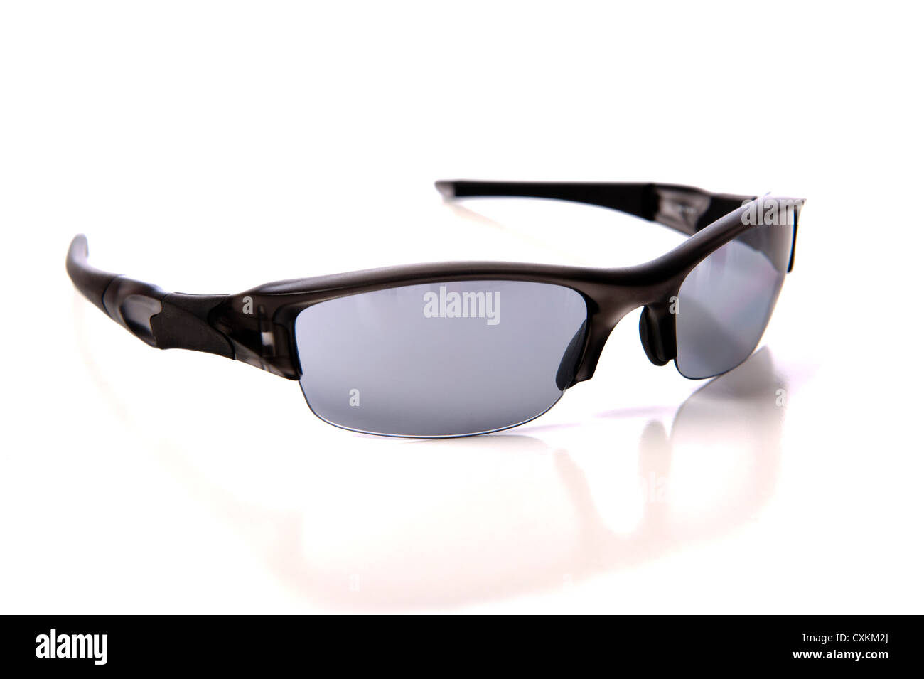 A pair of sports sunglasses or shades on a white background Stock Photo
