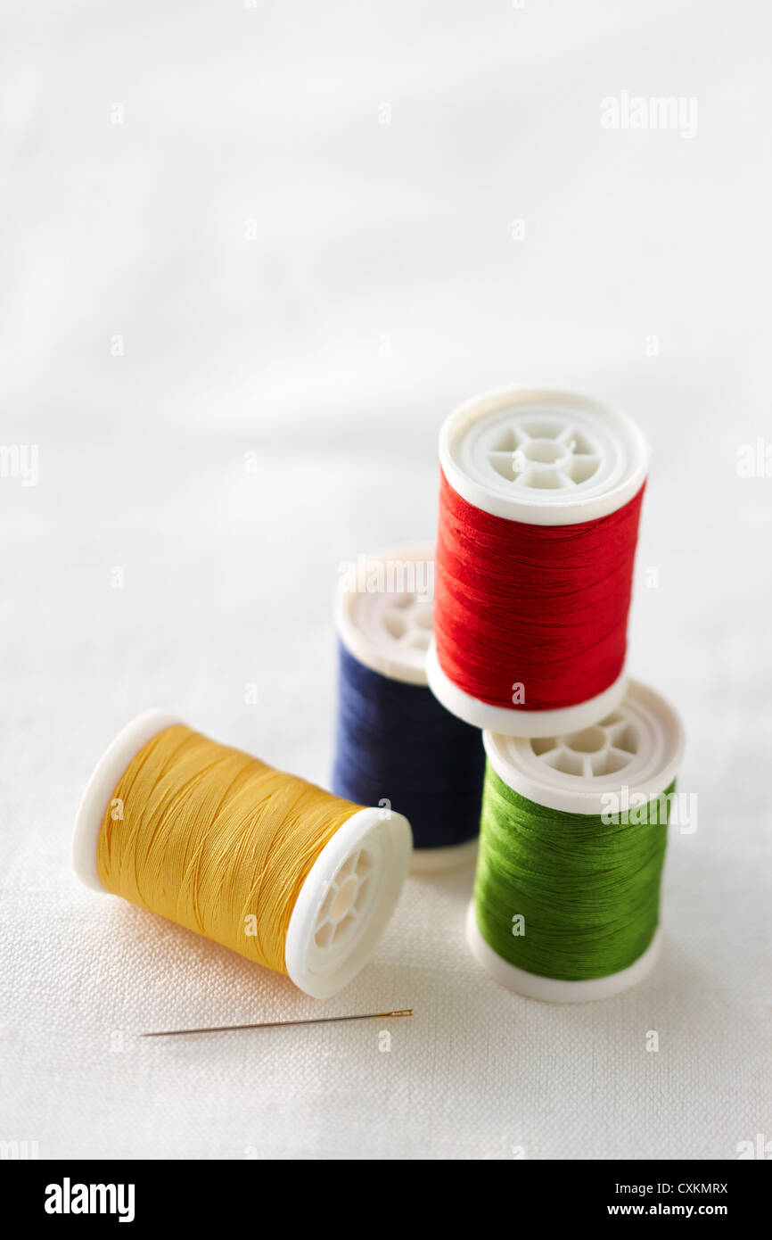 Spools of Thread and Sewing Needle Stock Photo Alamy