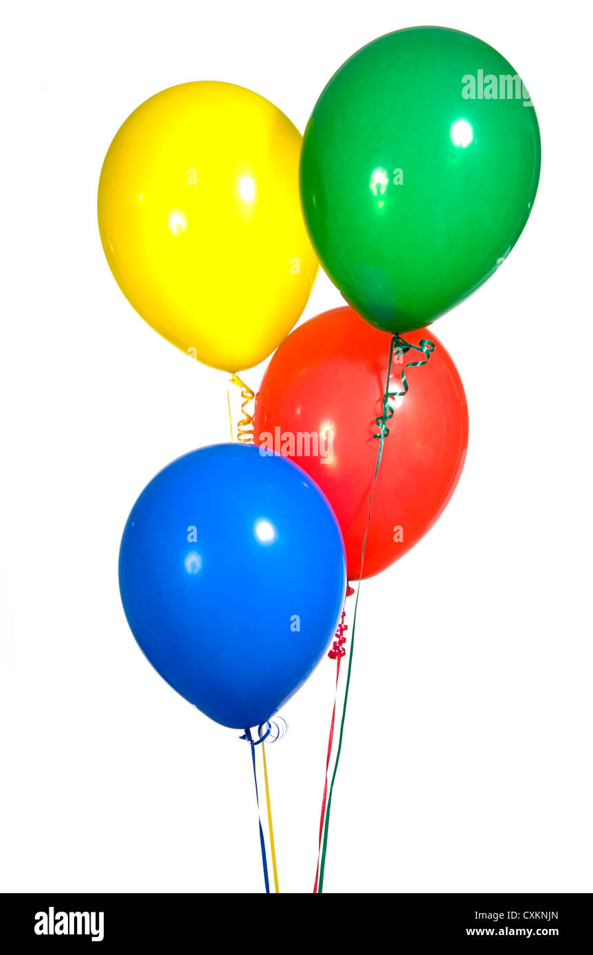 Primary colored party balloons with ribbons on white background Stock Photo
