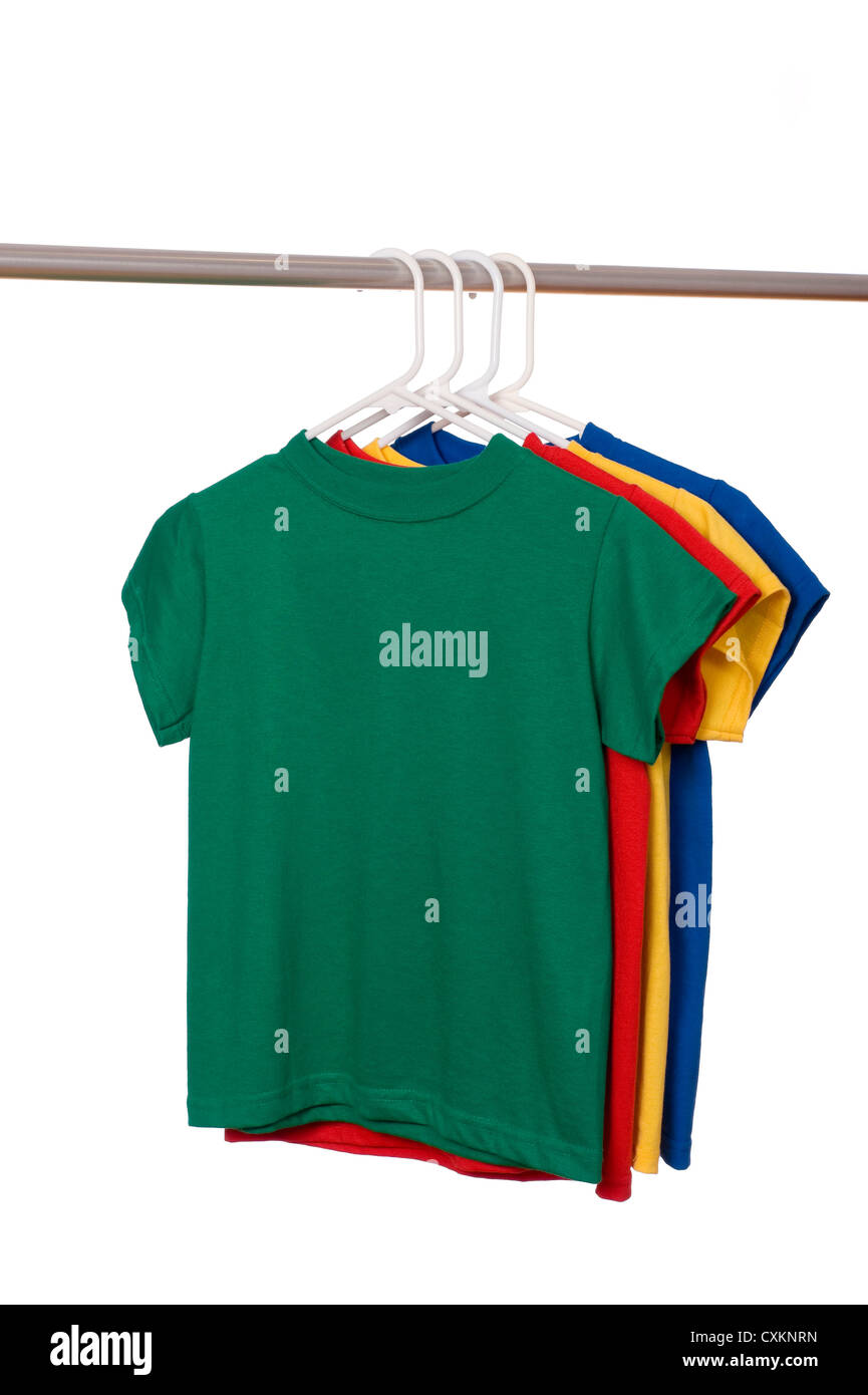 A row of colorful row t-shirts hanging on hangers on a white background Stock Photo