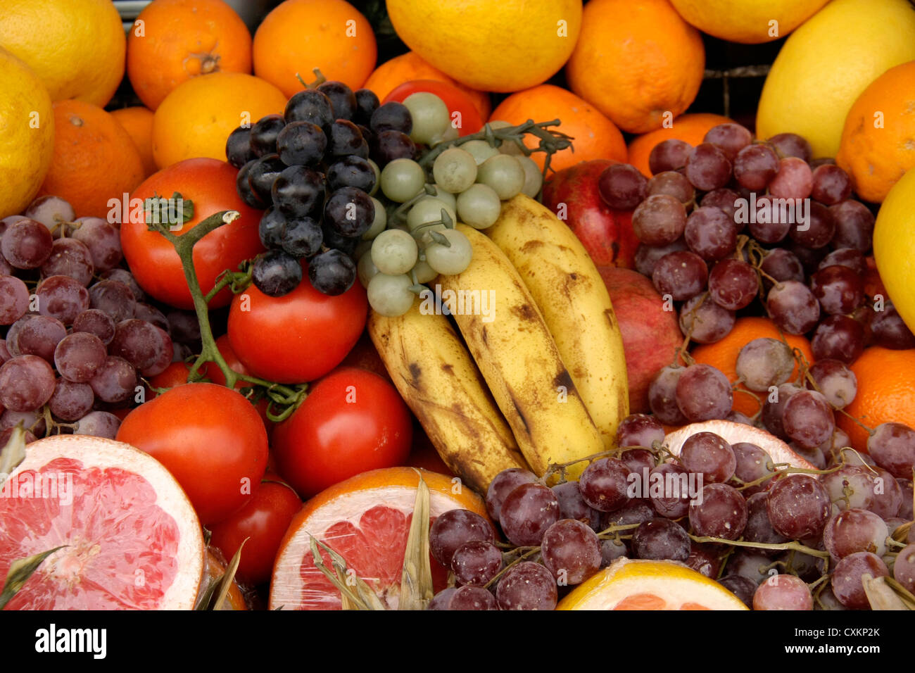 different types of fruits displayed for sale in a basket Stock Photo