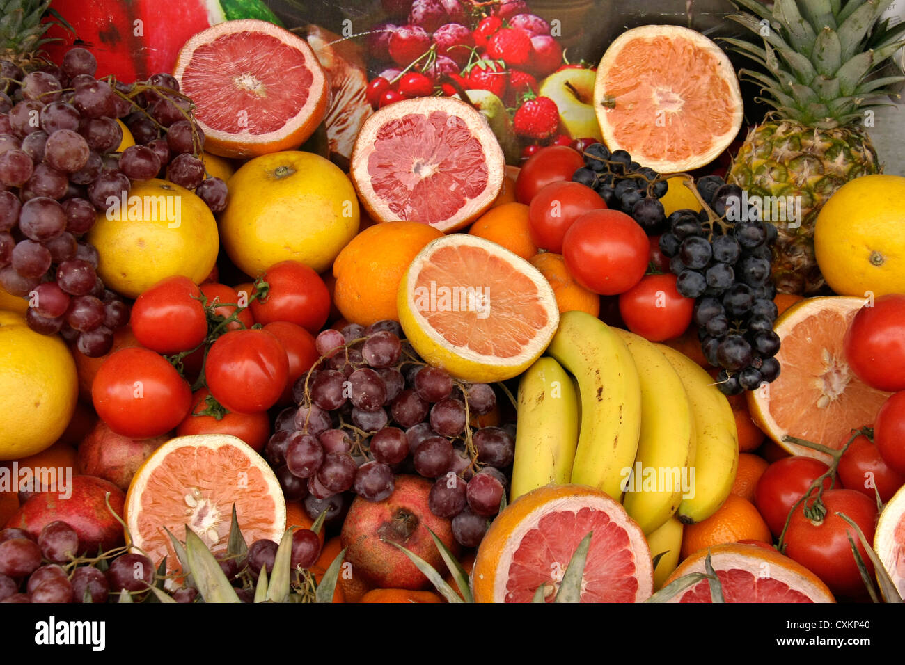 different types of fruits displayed for sale in a basket Stock Photo