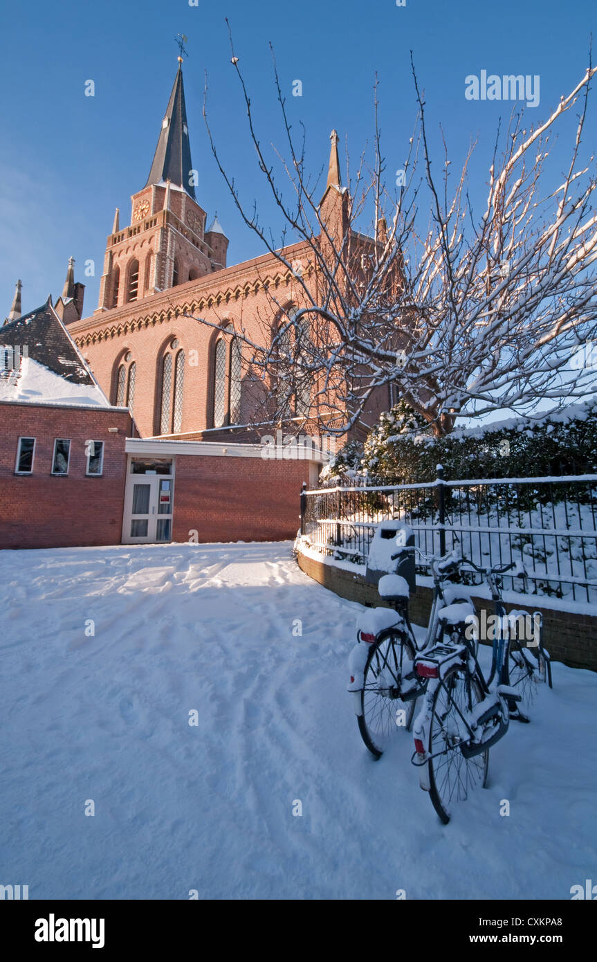 Dorpskerk with Bikes in Winter, Voorschoten, The Netherlands Stock Photo