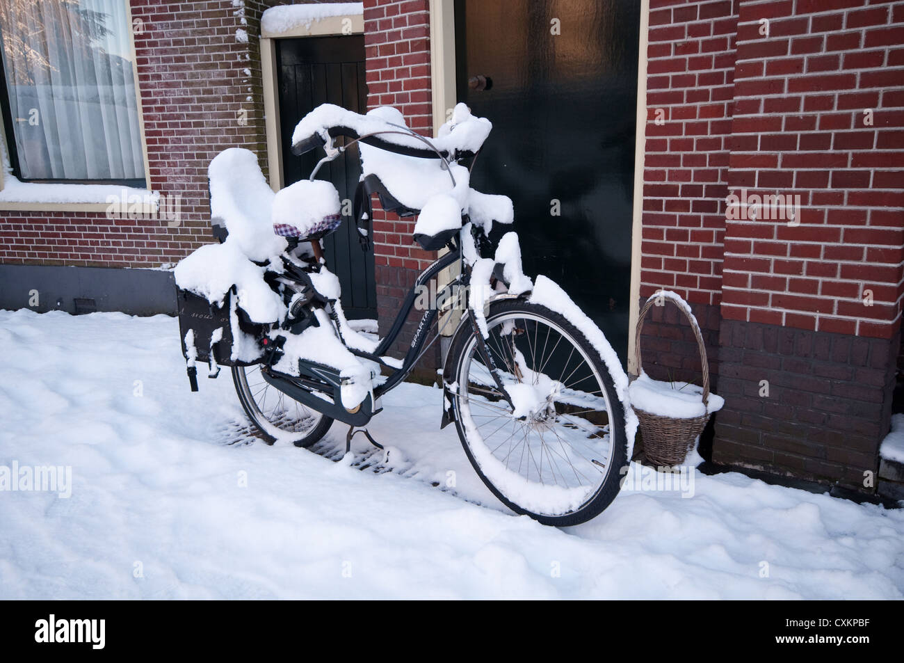 Snow laden Bicycle, Voorschoten, The Netherlands Stock Photo