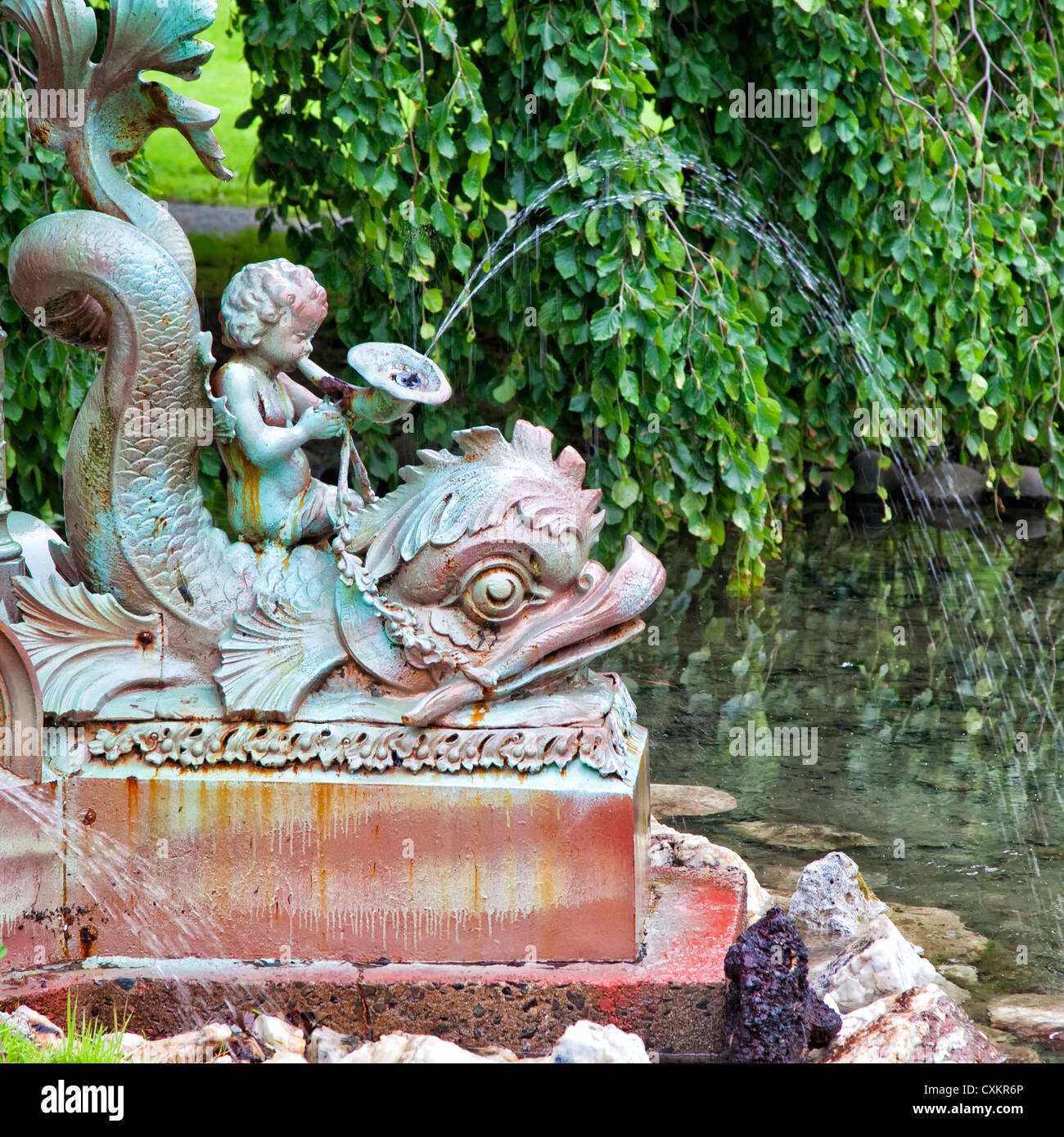 1920s Large Bronze Fountainhead Cherub With Fish and Heron Garden Statue