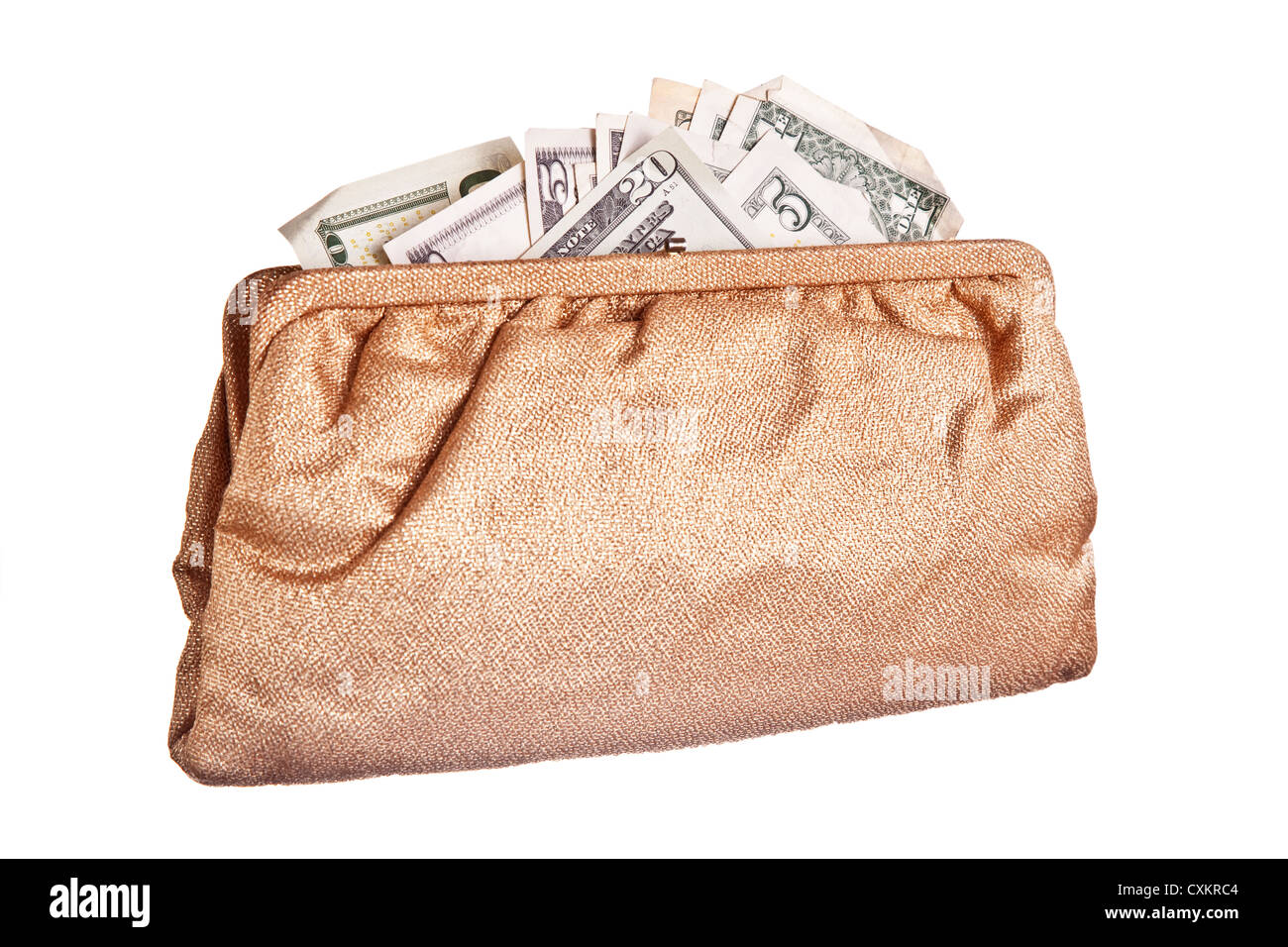 An evening bag full of small denomination bills. Stock Photo