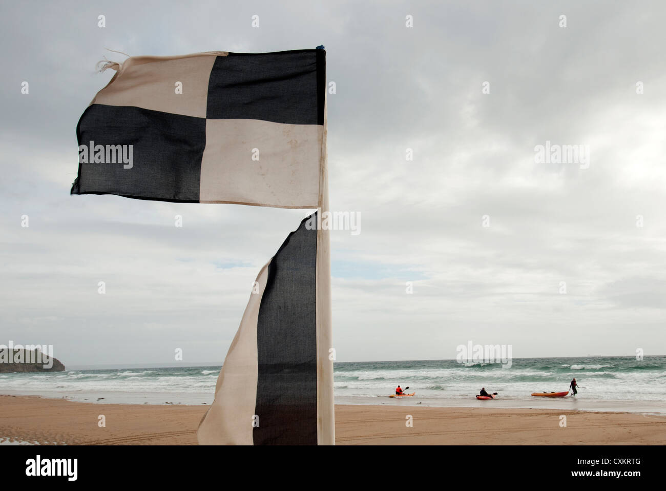 black & white flags lifeguard beach Stock Photo