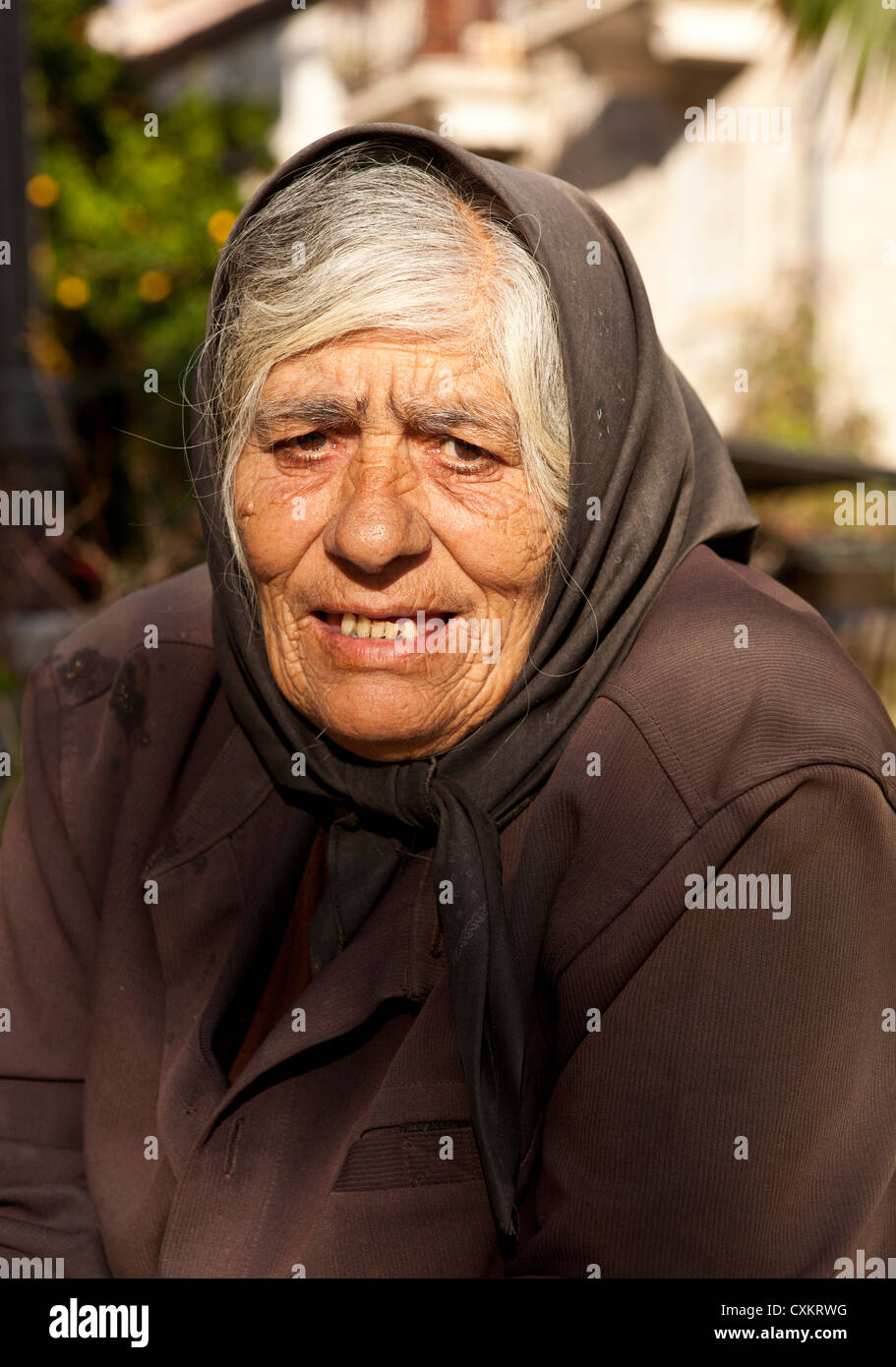 Old Albanian woman in head scarf Stock Photo - Alamy