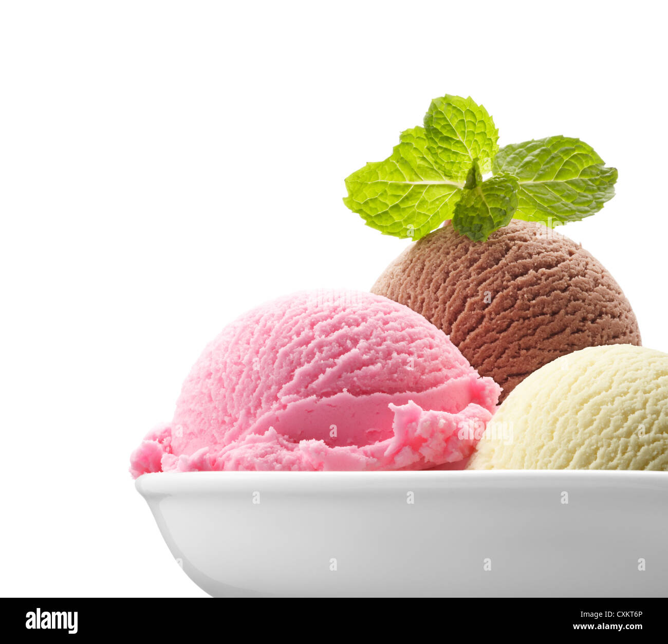three scoops of ice cream with mint Stock Photo