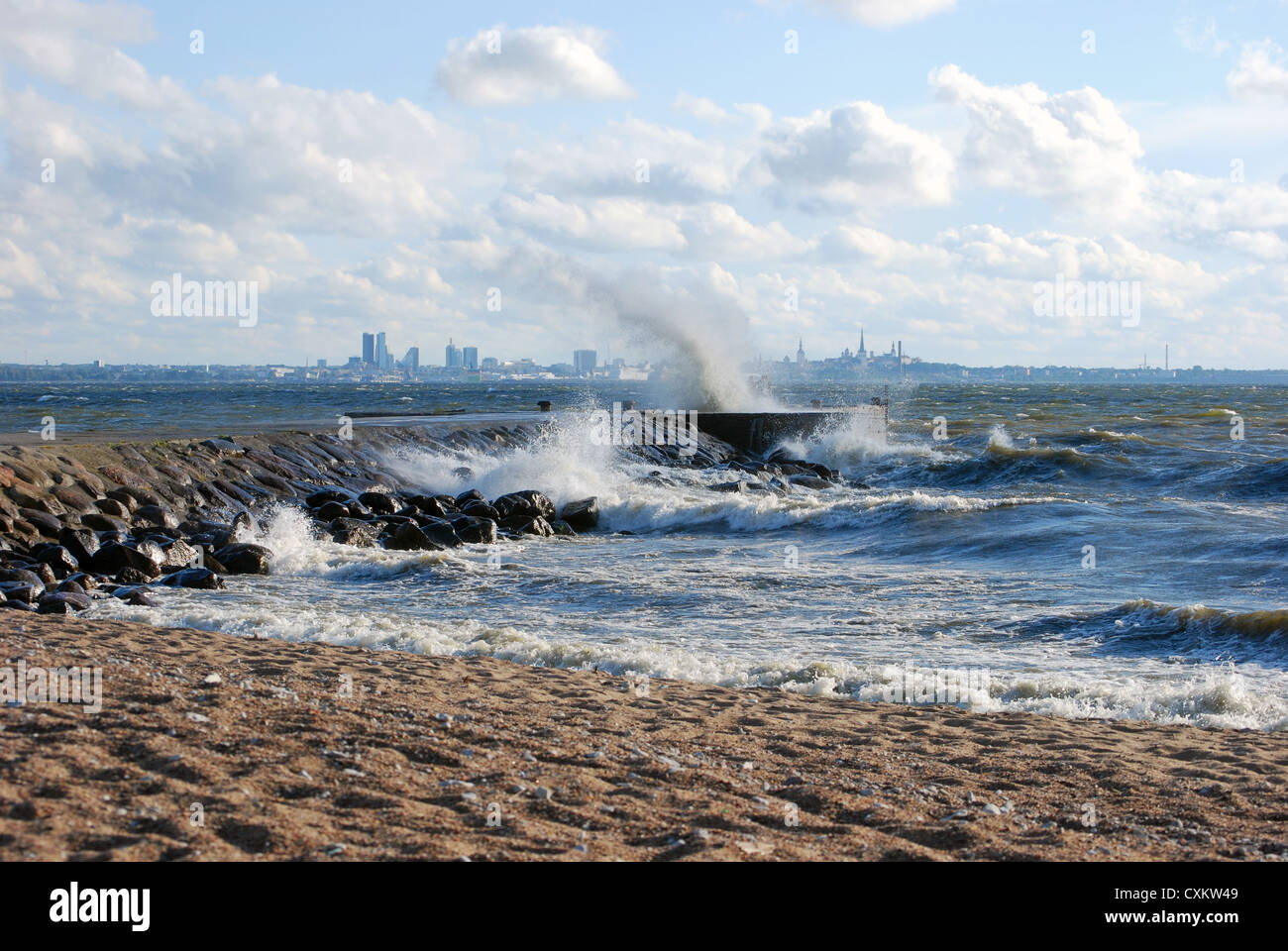 Storm on sea. Estonian capital Tallinn at background Stock Photo