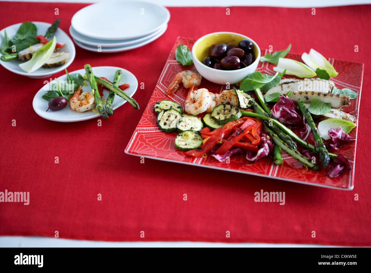 Antipasto with Grilled Vegetables, Shrimp, and Olives Stock Photo