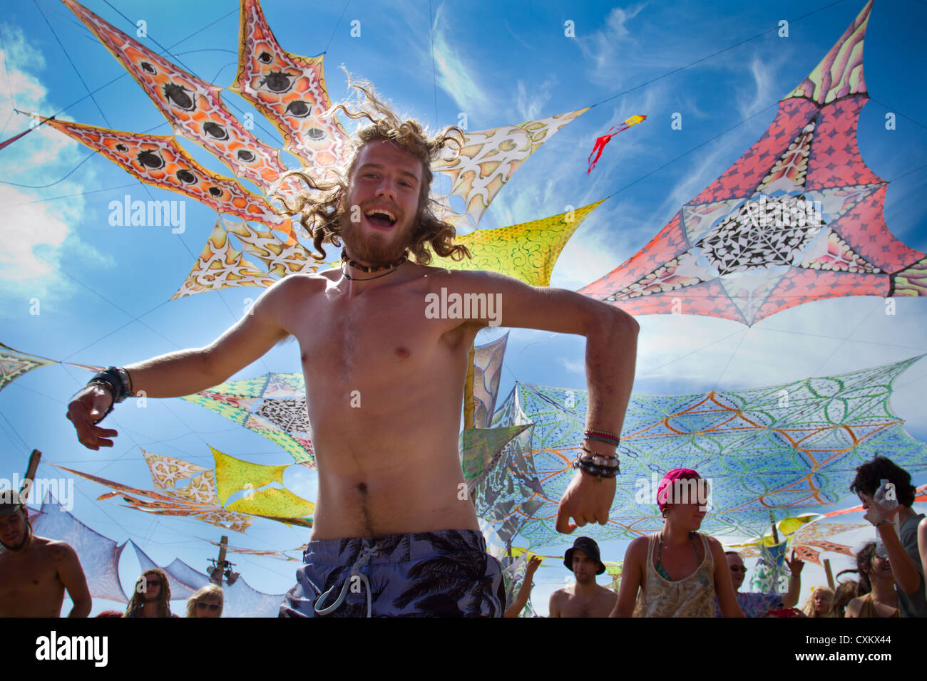 People attend the Lost Theory Festival in Croatia for a big trance open-air festival that lasts 6 days, 2012 Stock Photo