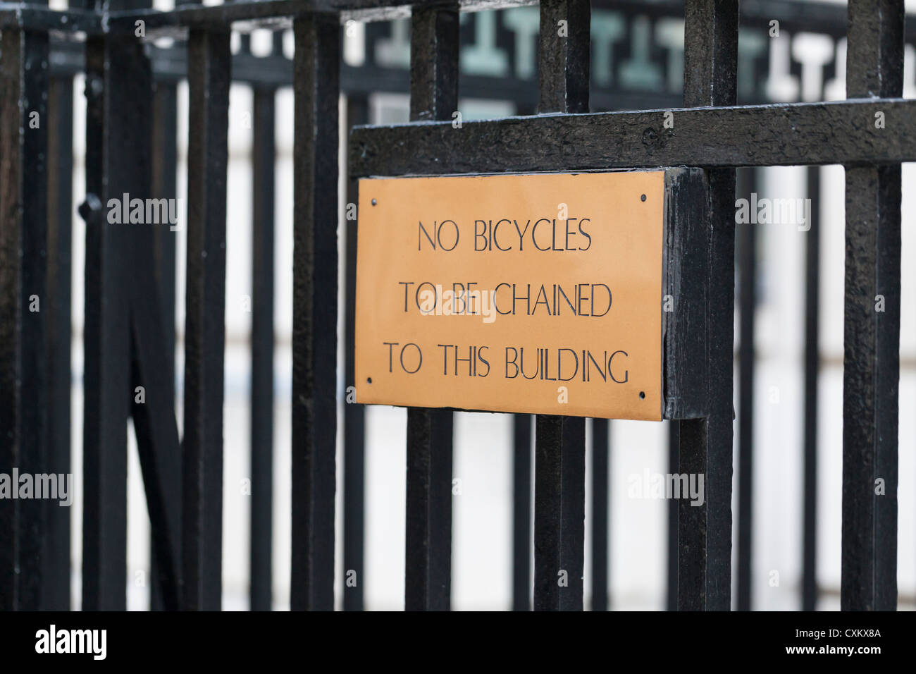 Do not chain bicycle to these railings notice in central London, England Stock Photo