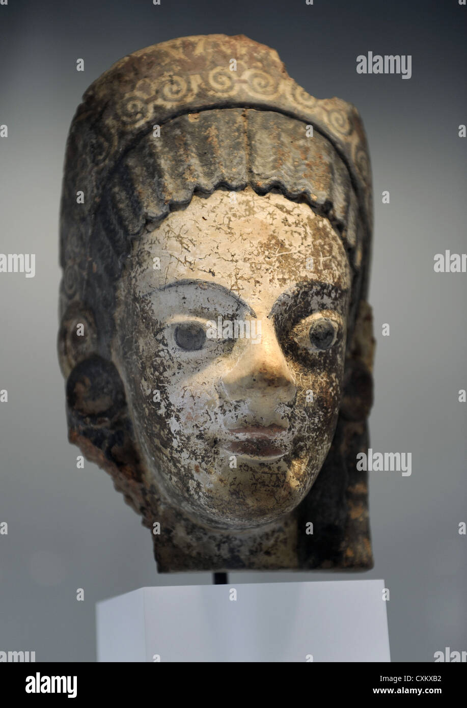 Greek Art. Archaic Period. Head of goddess. Ny Carlsberg Glyptotek. Copenhagen. Denmark. Stock Photo