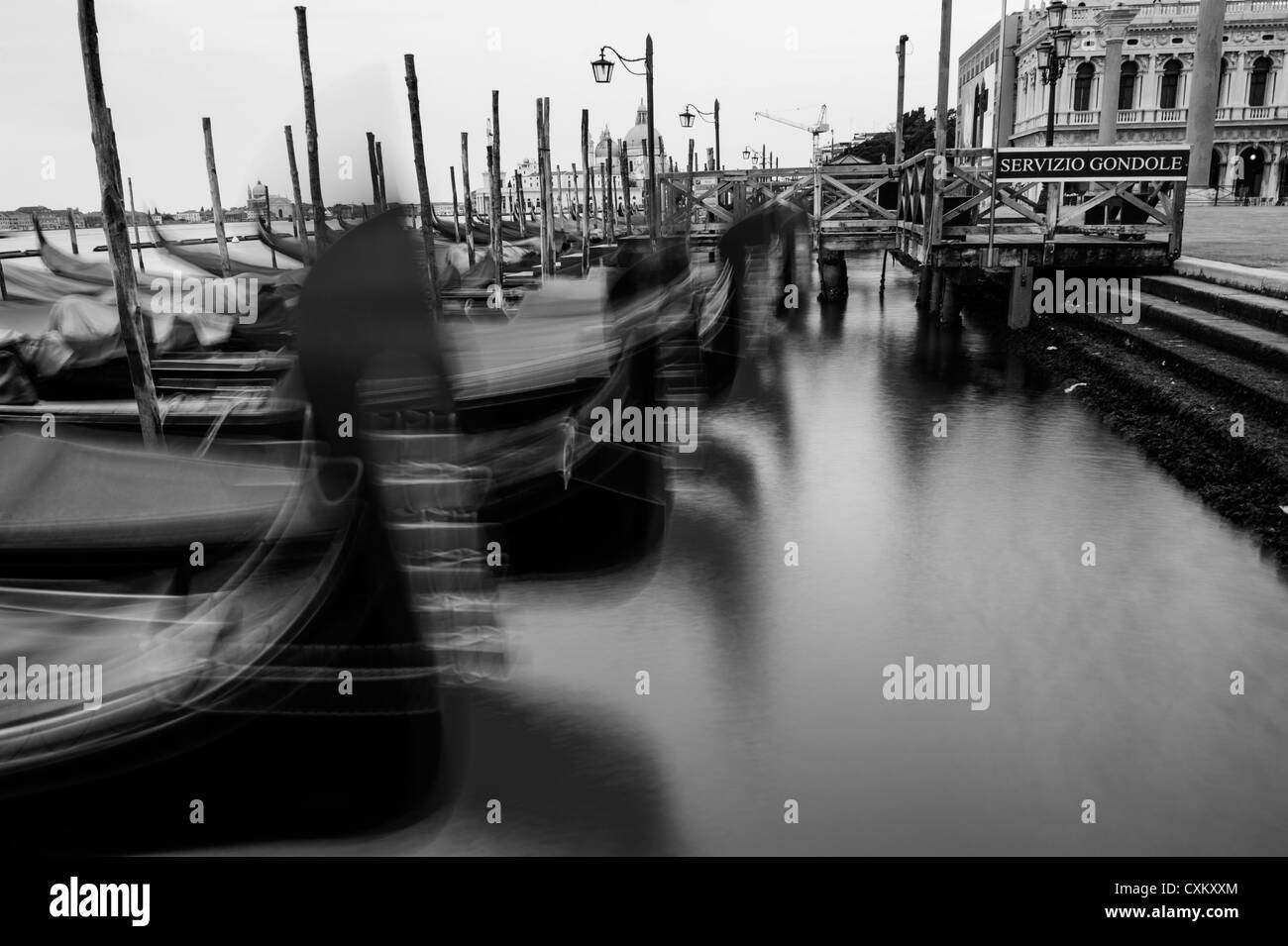 Gondolas Moored by the St. Mark's Basin, Venice, Italy. Stock Photo