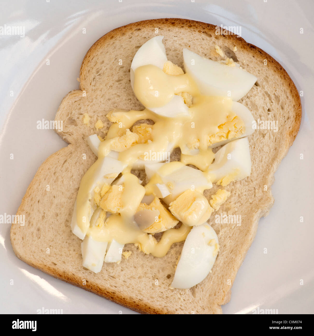 Egg and Mayonnaise On A Slice Of White Bread Stock Photo Alamy