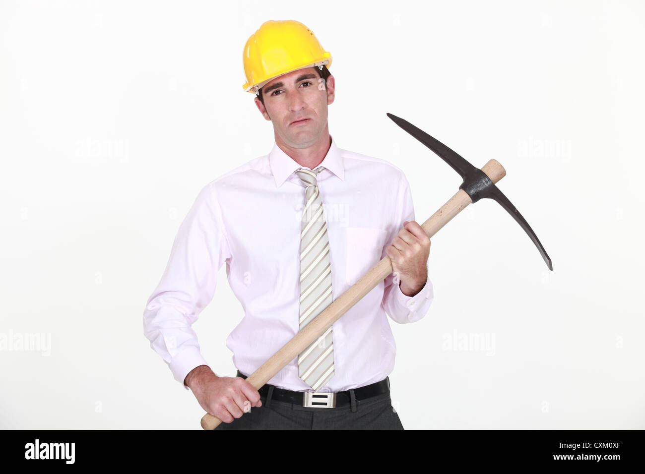 Businessman holding axe Stock Photo Alamy