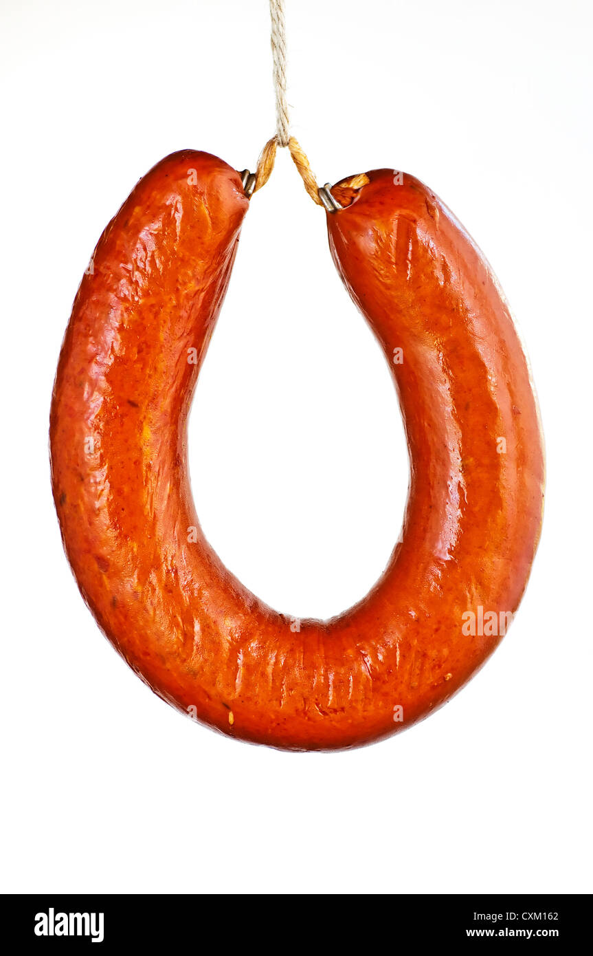 smoked spicy Polish sausage Kielbasa on white background Stock Photo