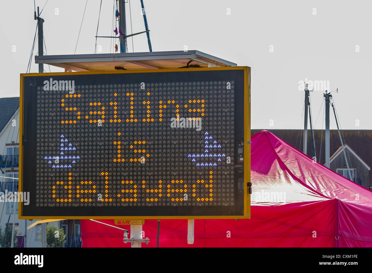 'Sailing is delayed' sign at 2012 Olympics in Weymouth - due to lack of wind. Stock Photo