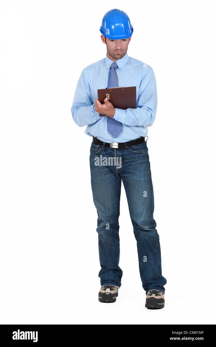 Building planner holding clip-board Stock Photo