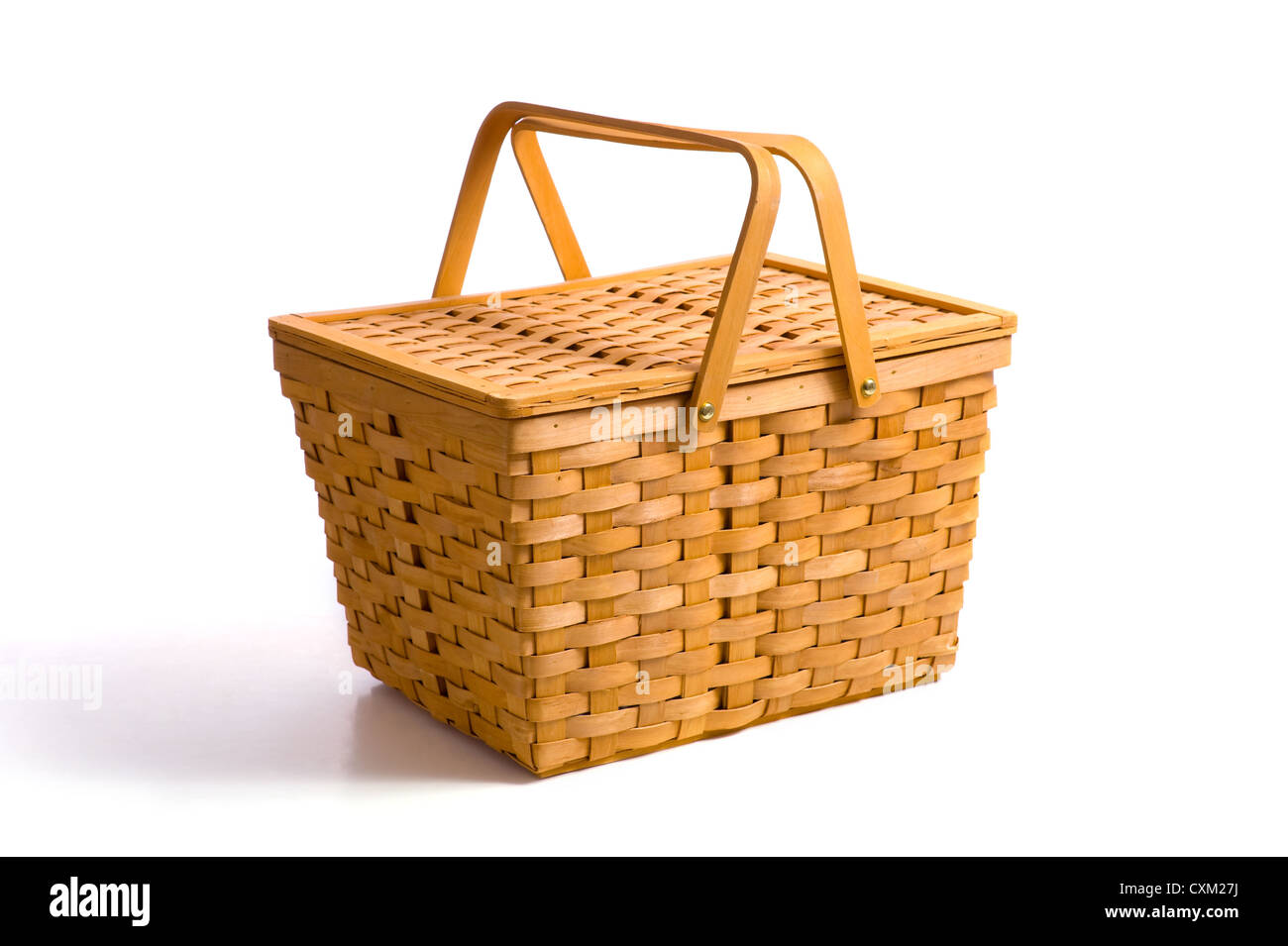 A wicker picnic basket on a white background with copy space Stock ...