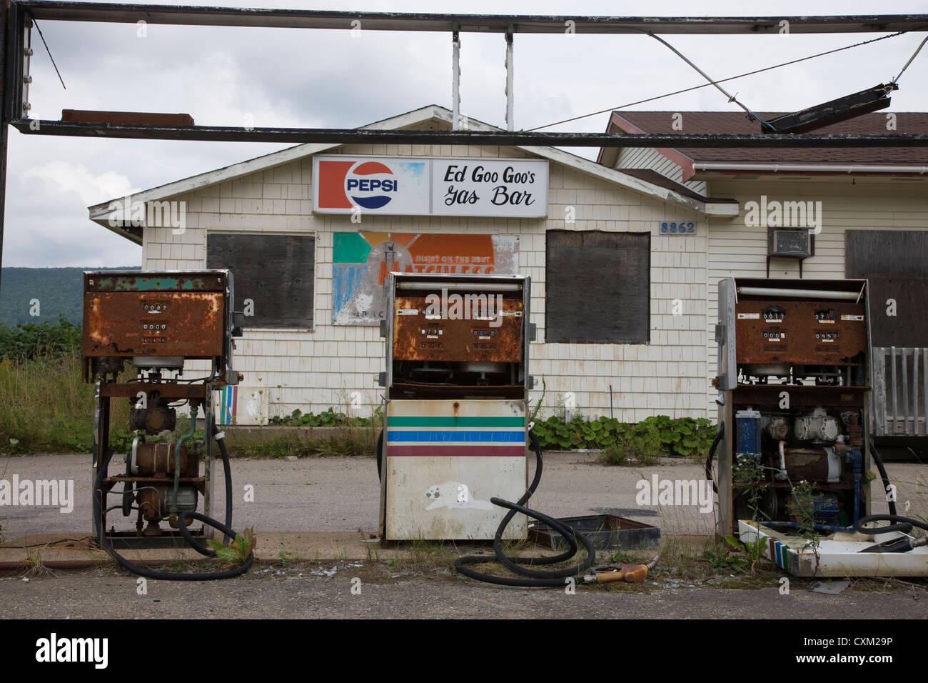Derelict petrol pumps at Ed Goo Goo's Gas Bar in Canada Stock Photo