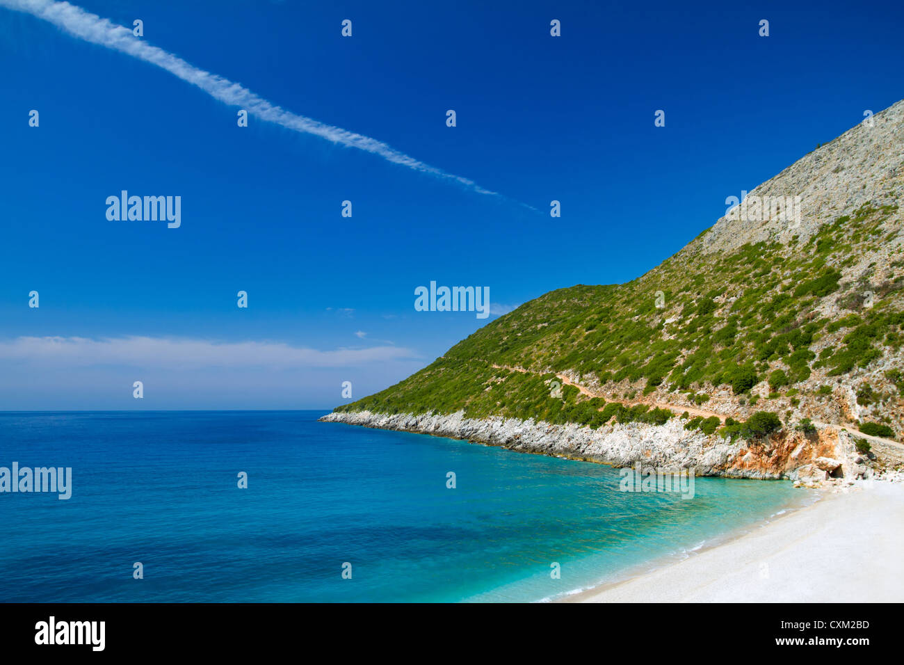 Beautiful sunny beach with white sand and blue water Stock Photo