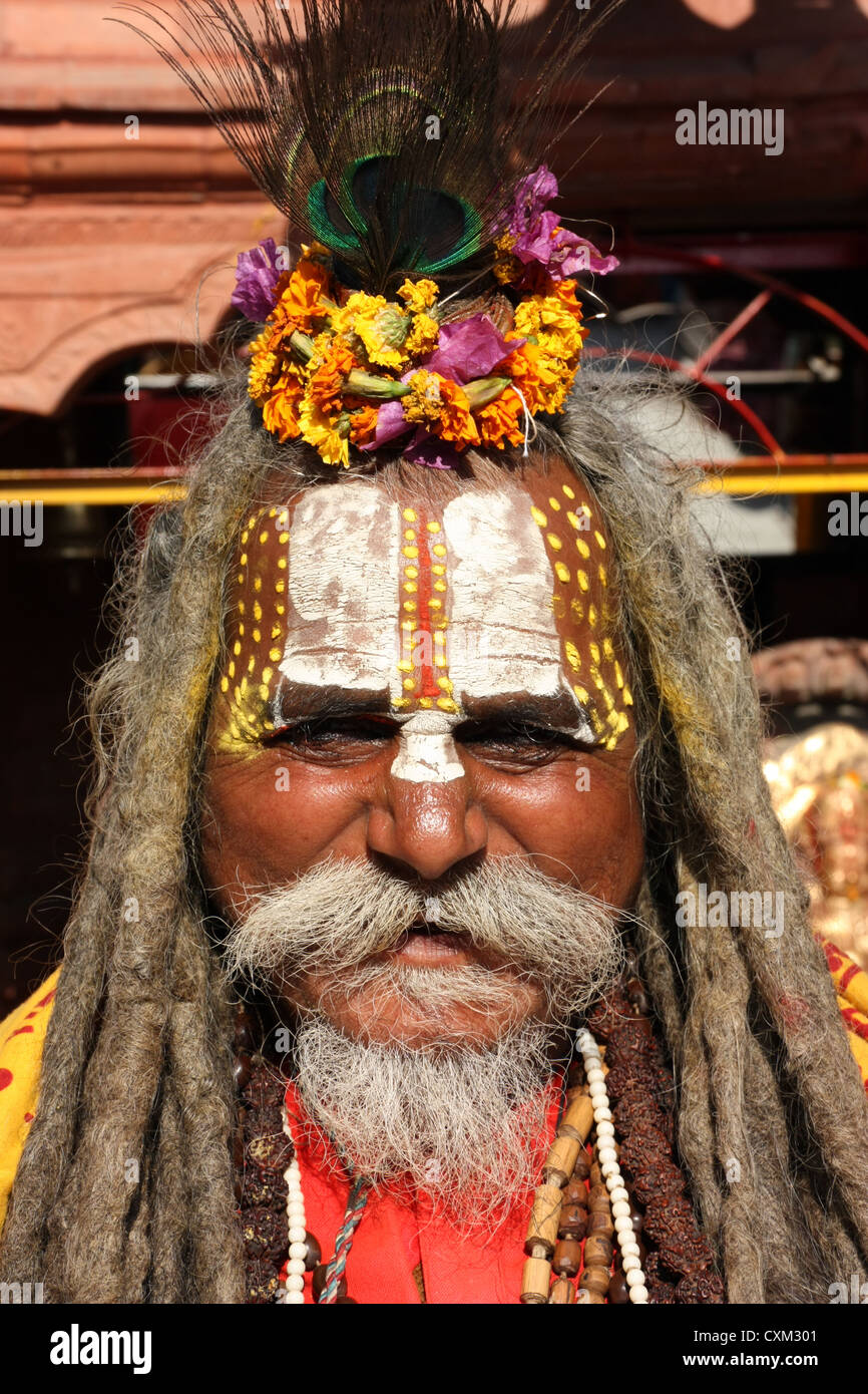 Hindu sadu holy man outside temple in Kathmandu, Nepal Stock Photo