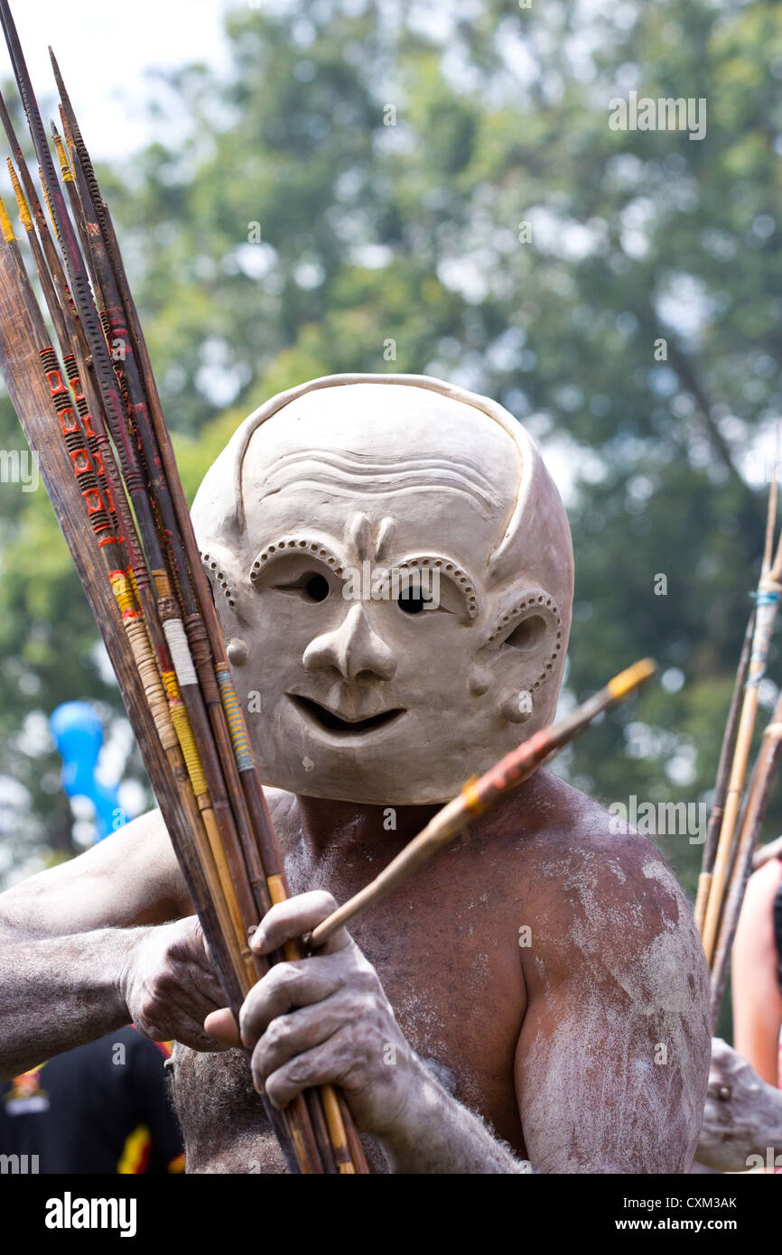 Mud man wearing a mud mask at the singsing Goroka Festival, Papua New