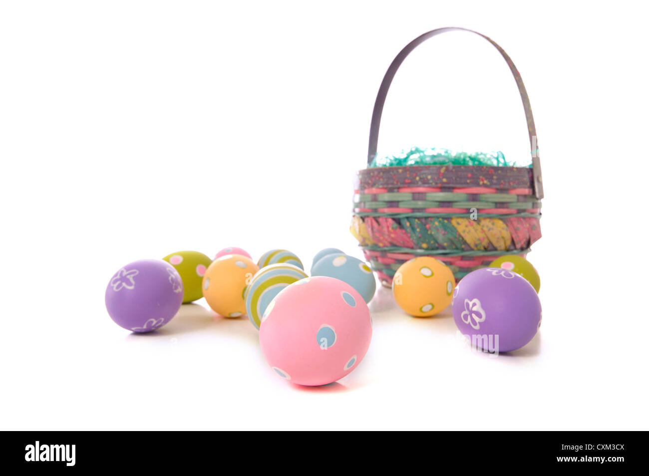 Easter Eggs and basket on white background Stock Photo - Alamy
