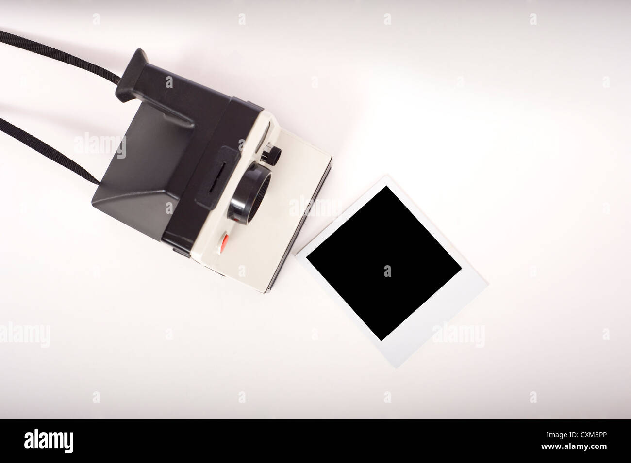 An instant transfer camera with a photographic print with clipping path ...