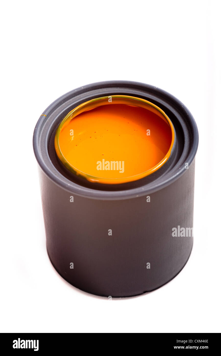 Colorful can of orange paint on a white background with space for copy