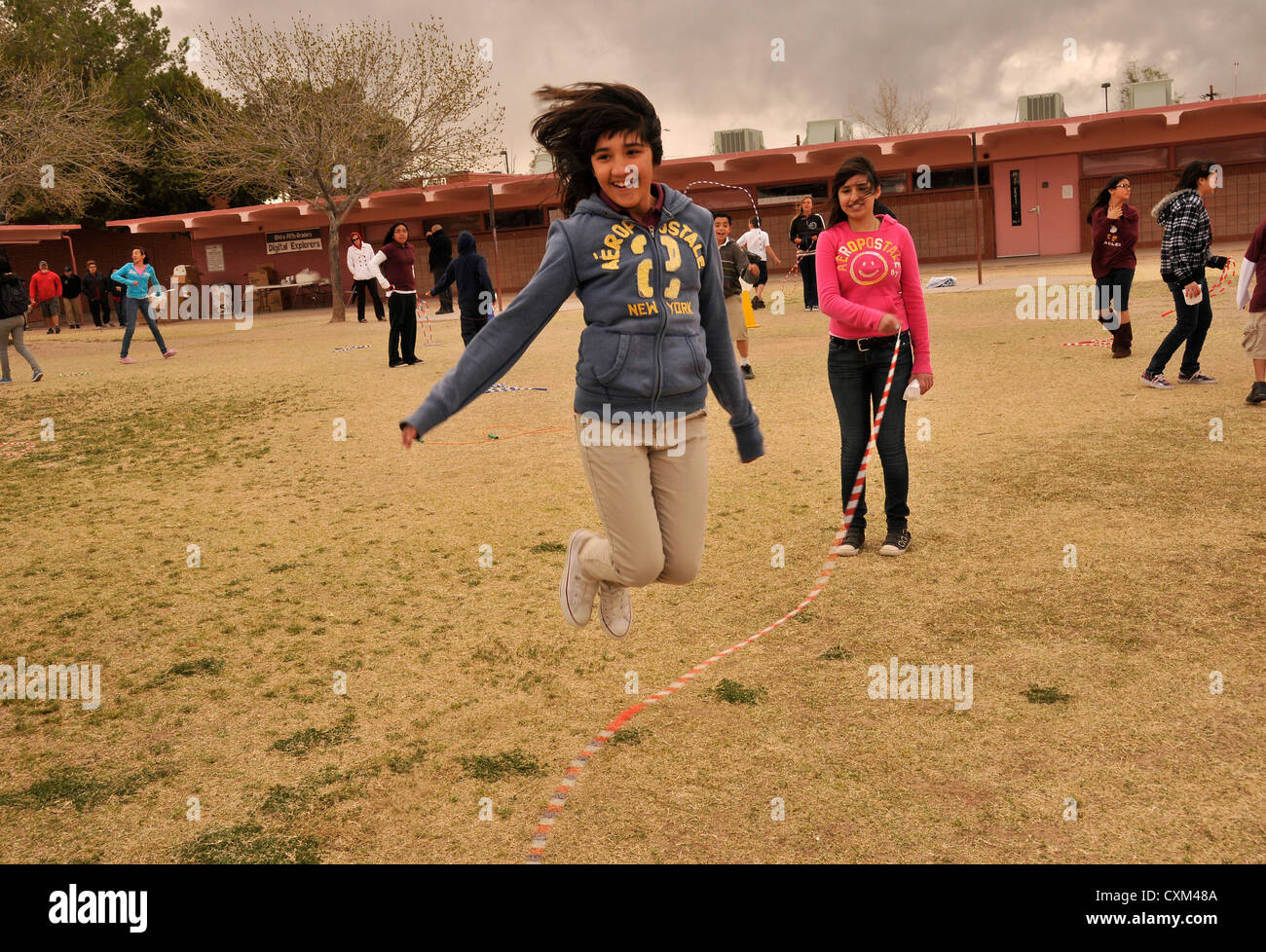 5th-graders participates in Jump Rope For Heart, a fund raising and ...