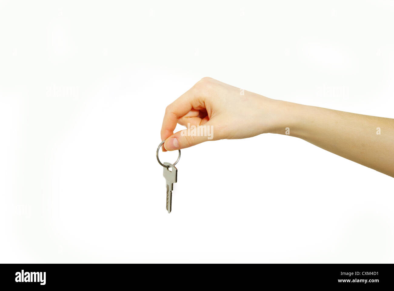 key in hand isolated on white Stock Photo - Alamy