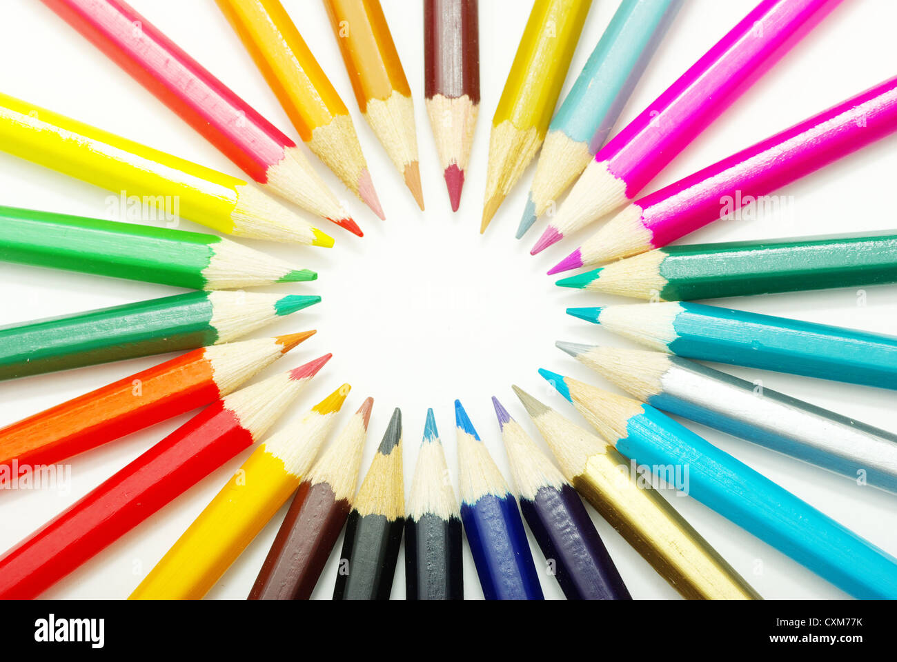 Assortment of coloured pencils on white background Stock Photo