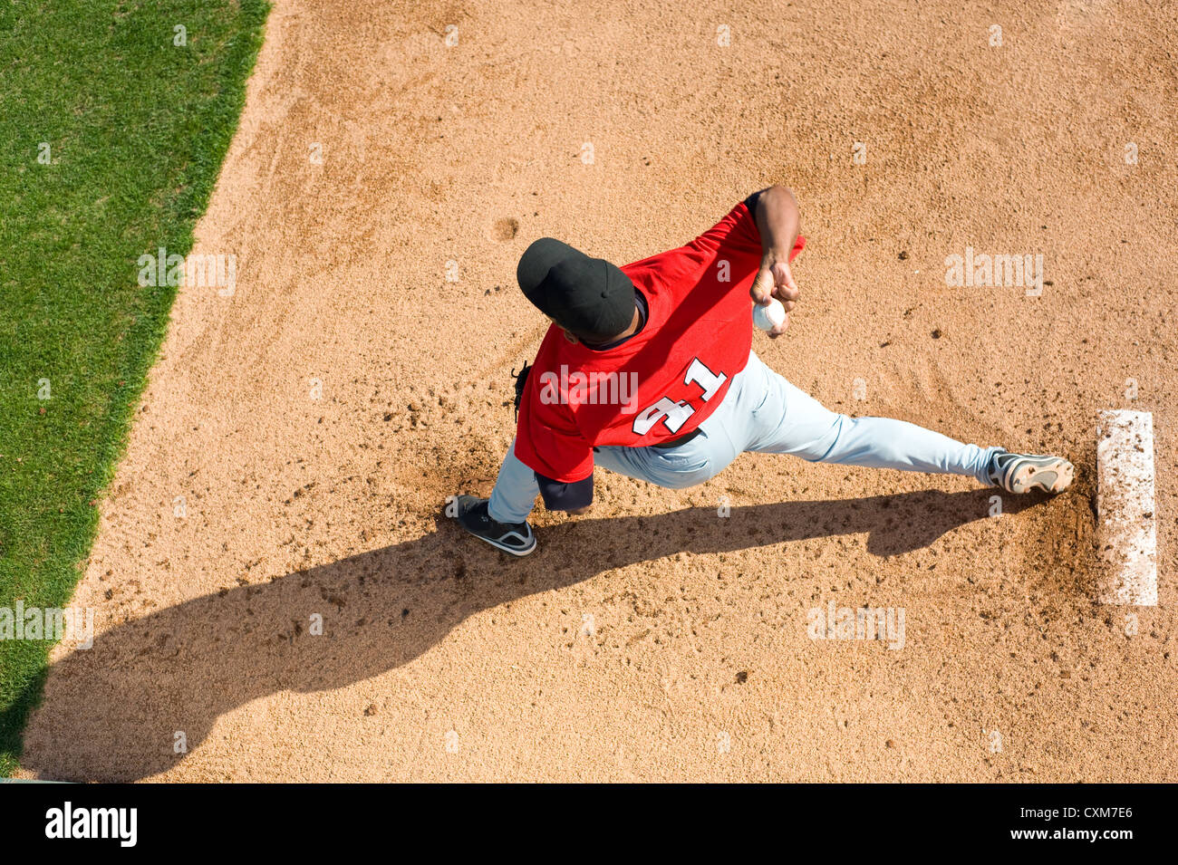 a baseball pitcher throwing a pitch with copy space Stock Photo