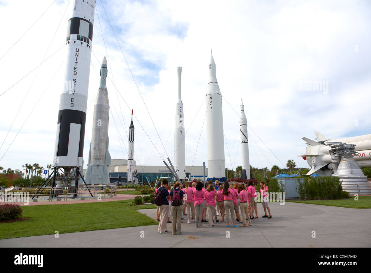 school group taking guided tour of the rocket garden at Kennedy Space Center Florida USA Stock Photo