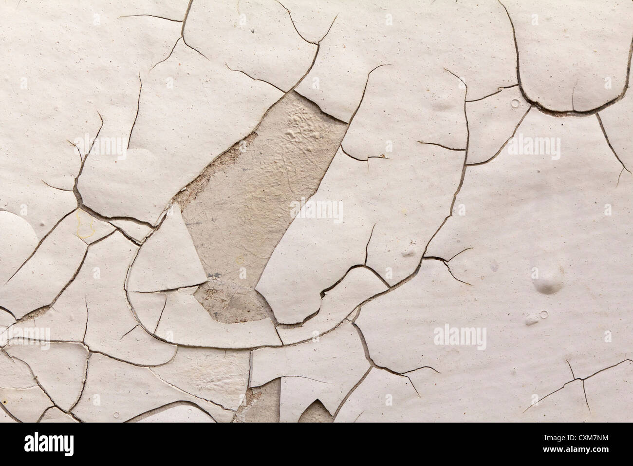 Peeling, chipped paint on wall. Stock Photo