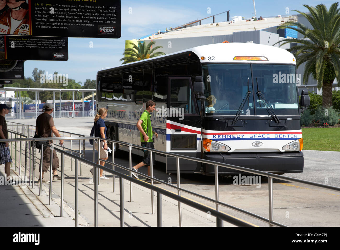 visitors boarding a bus for a guided tour of Kennedy Space Center Florida USA Stock Photo