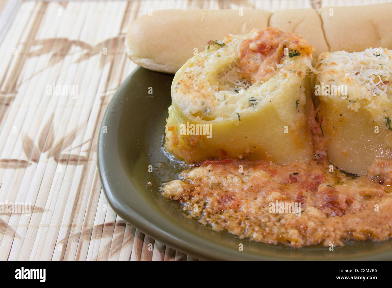 lasagana filled with mozzarella, ricotta, parmesan and romano cheese
