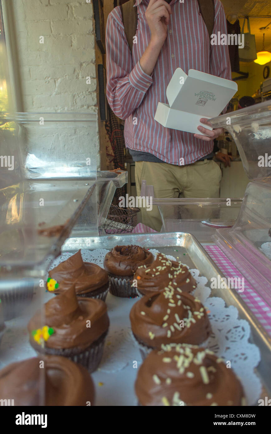 New York City, NY, USA, Man Choosing Cupcakes in American Bakery Shop, 'Magnolia' in Greenwich Village, Stock Photo