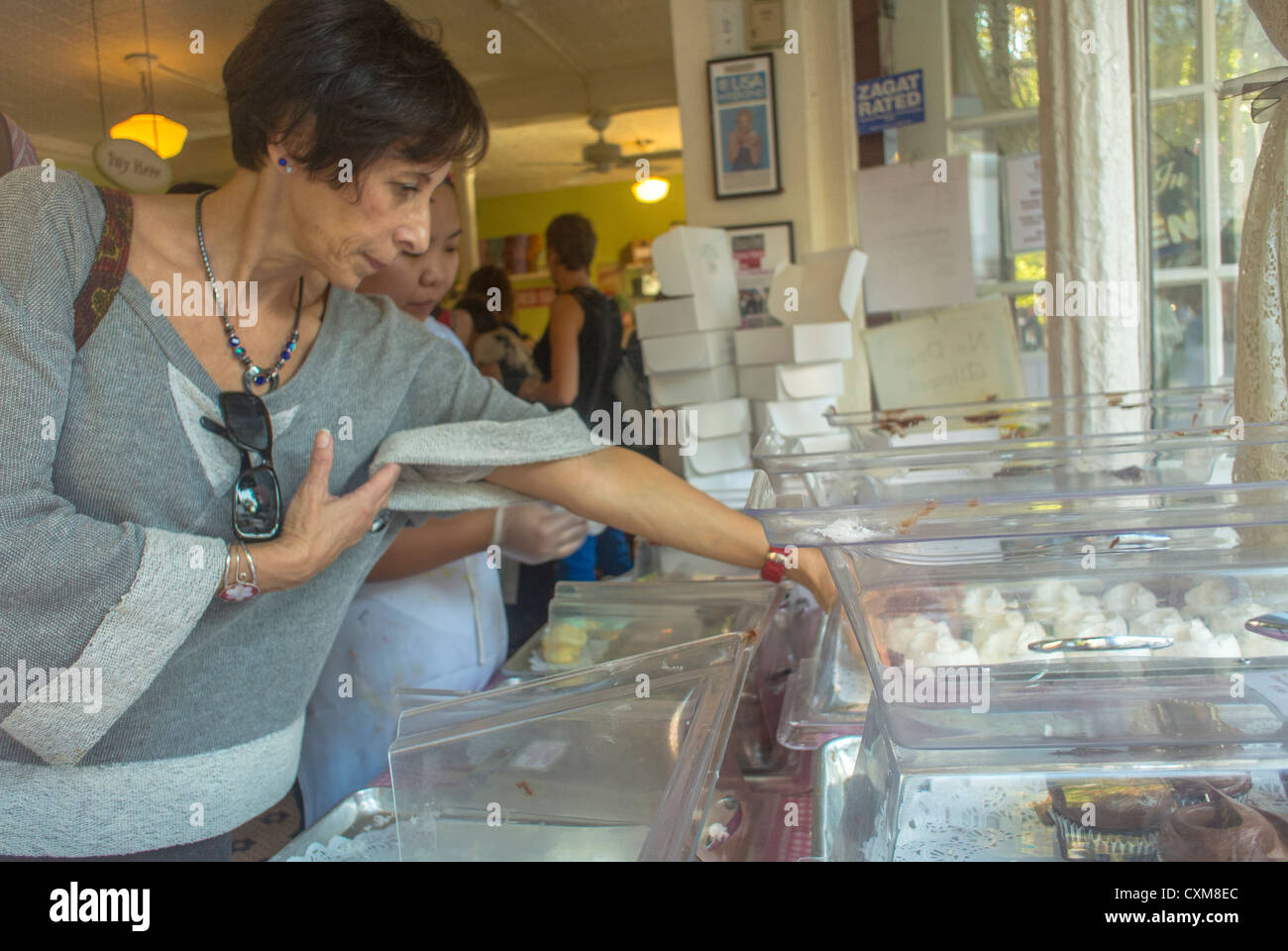 New York City, NY, USA, Woman Shopping in American Bakery Shop, interiors 'Magnolia'  in Greenwich Village, Manhattan, shopper choosing goods Stock Photo