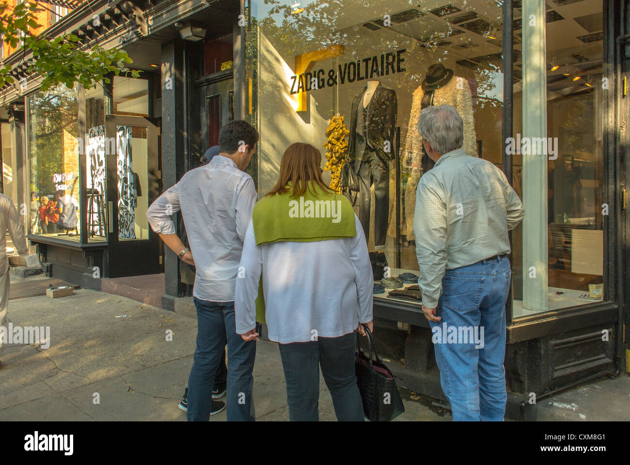 New York City, NY, USA, Street Scenes, Tourists Small Group People Shopping in Greenwich Village, Manhattan, Shop Front Window Shopping French Store, 'Zadig & Voltaire' fashion mannequins, rich luxury, Prestige consumer, rich neighborhood usa Stock Photo